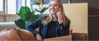 Business woman on the phone, smiling