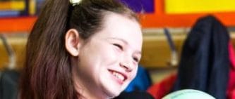 A school girl smiling