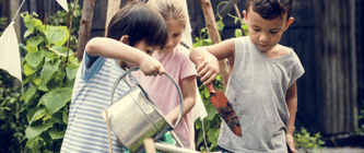 Two boys and a girl doing gardening