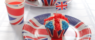 A union jack themed cupcake, plate and cup