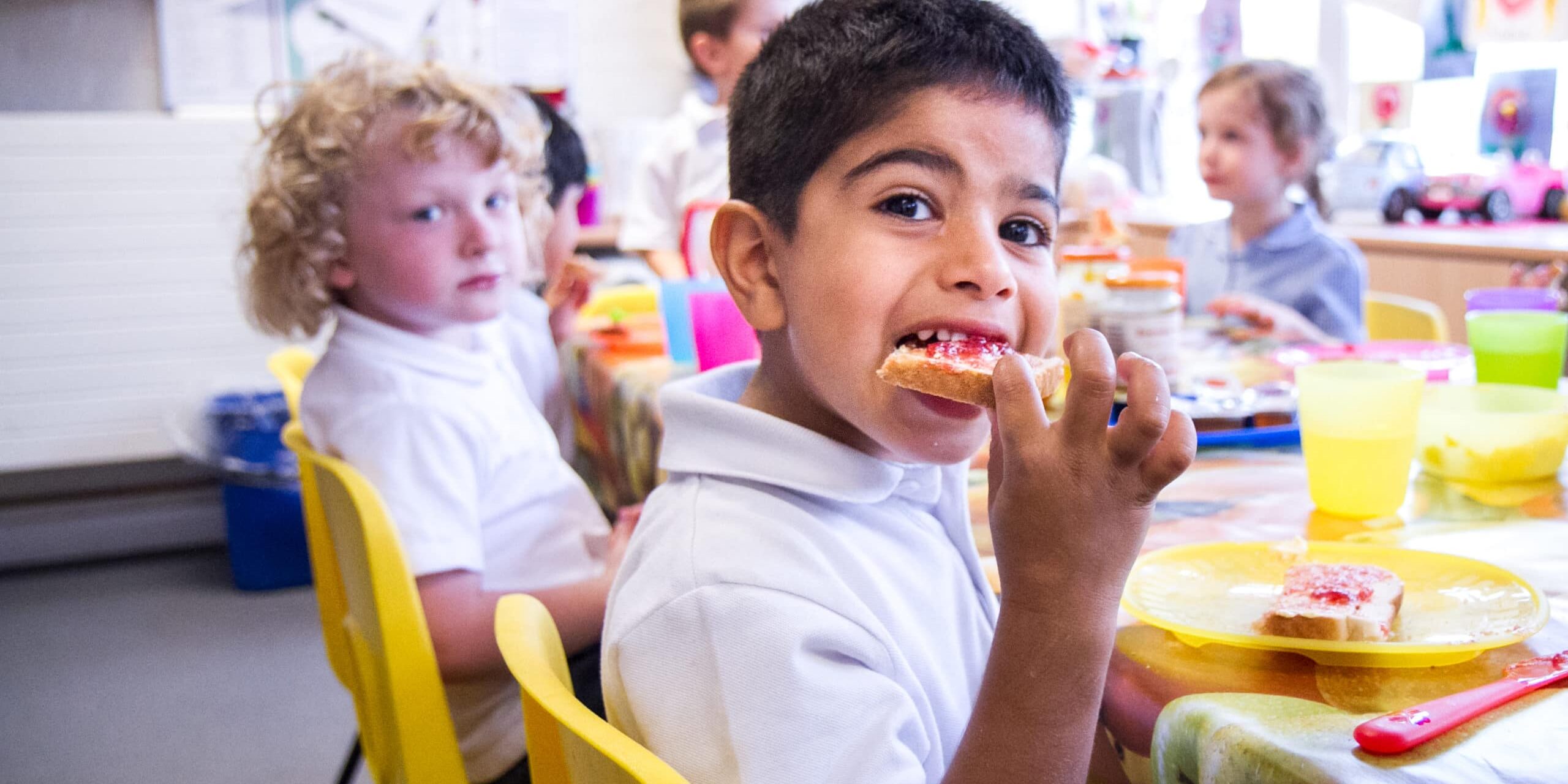 School children eating in a nurture room